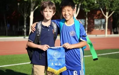 The Running BRFLS Students with the Rolling Football